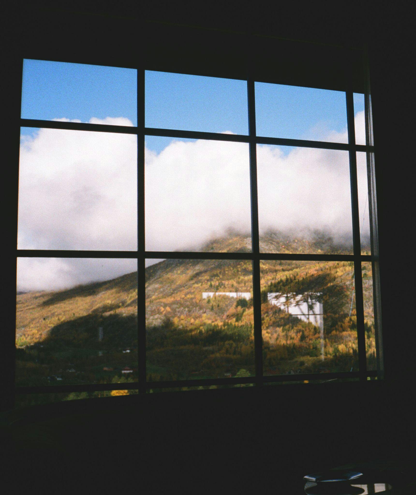 Window overlooking mountains