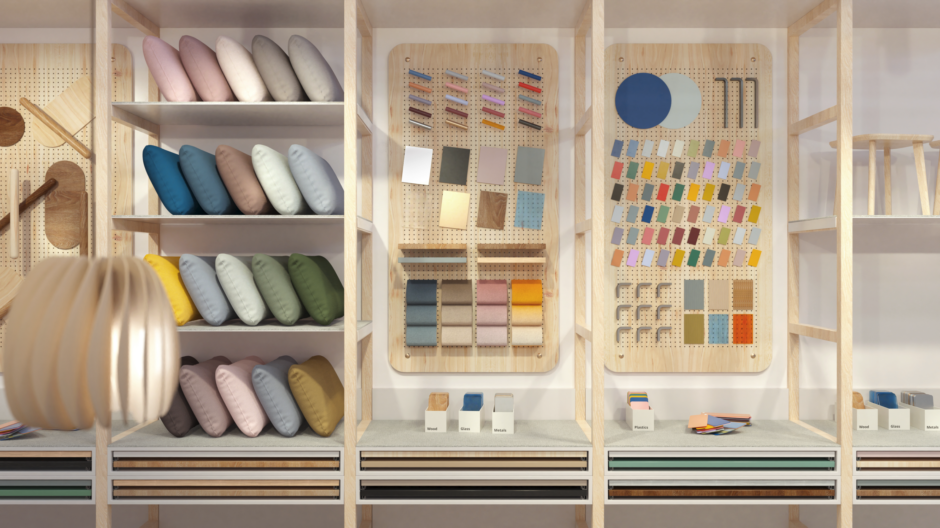 A well-organized display wall in a design studio or retail store, featuring rows of colorful throw pillows on wooden shelves alongside pegboards filled with material swatches, fabric samples, and color palettes.