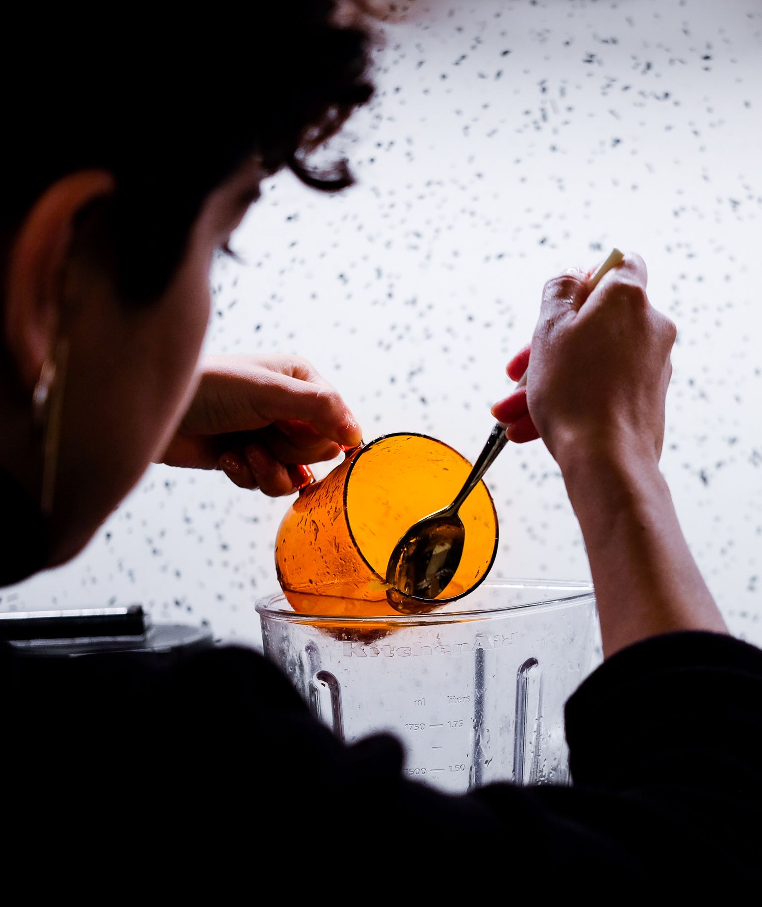 Woman pouring liquid