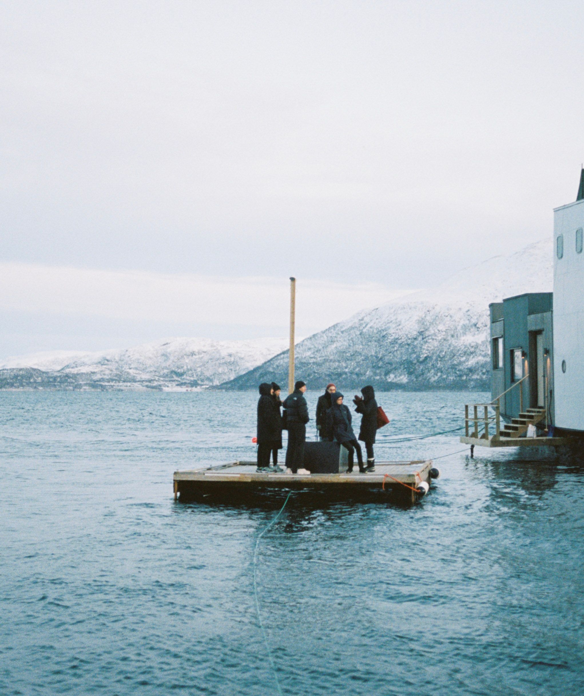 Group of people standing on a deck