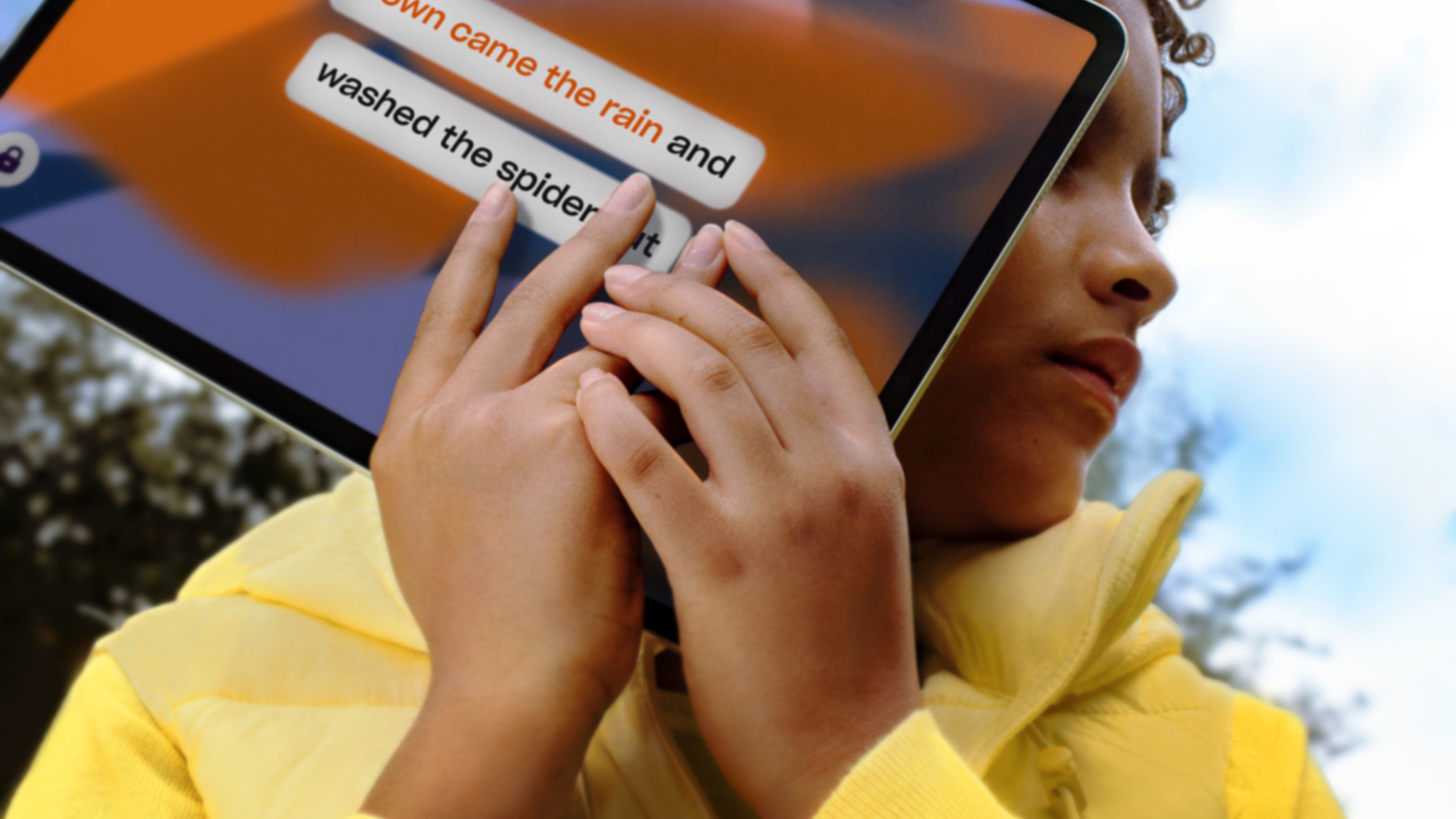 Close up of a child holding a tablet that displays lyrics of a well-known children's song and the Trall visualisations in the background.