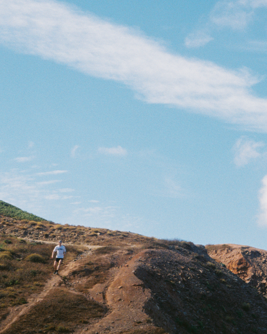 A man running down a hill