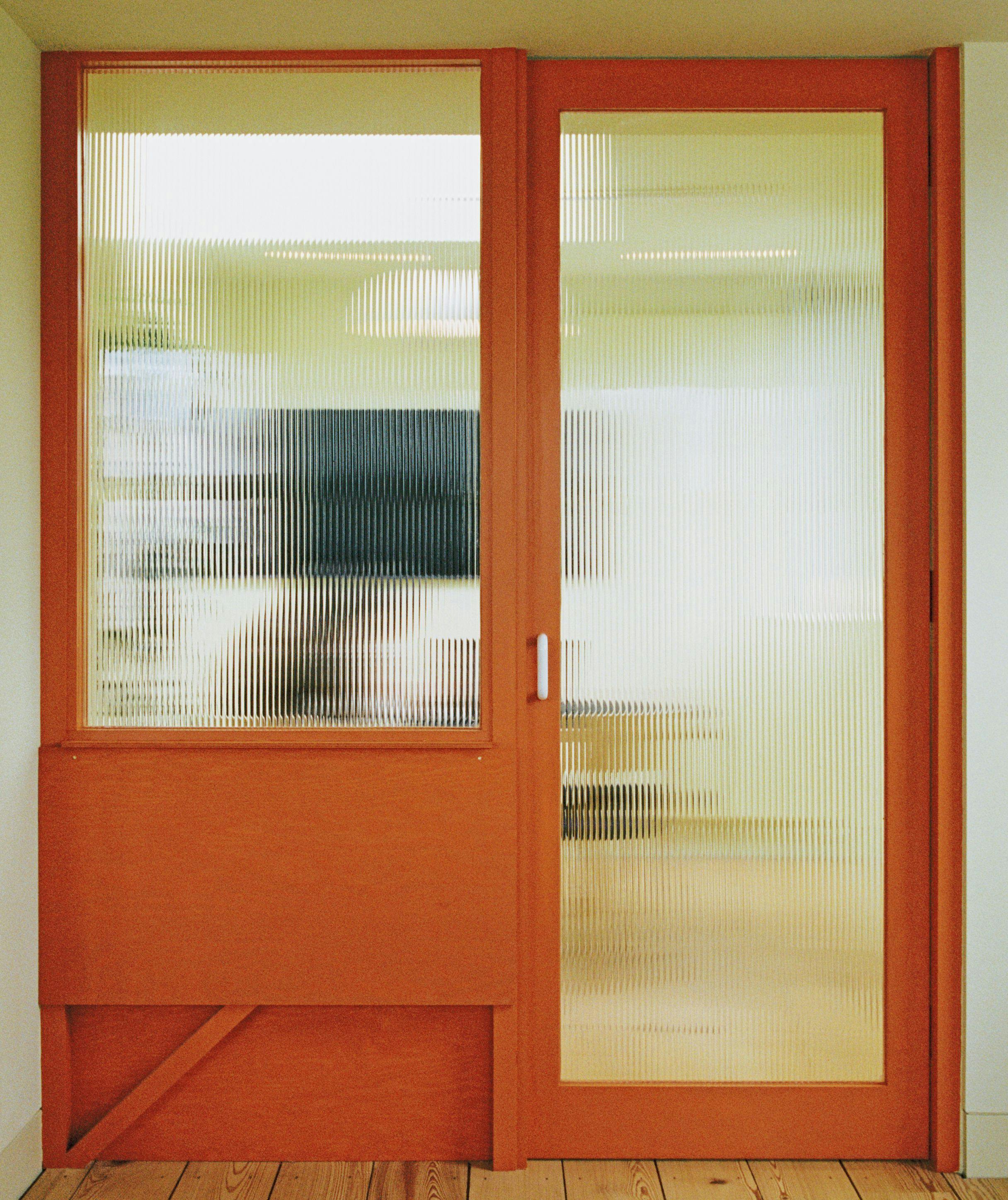 Orange glass door
