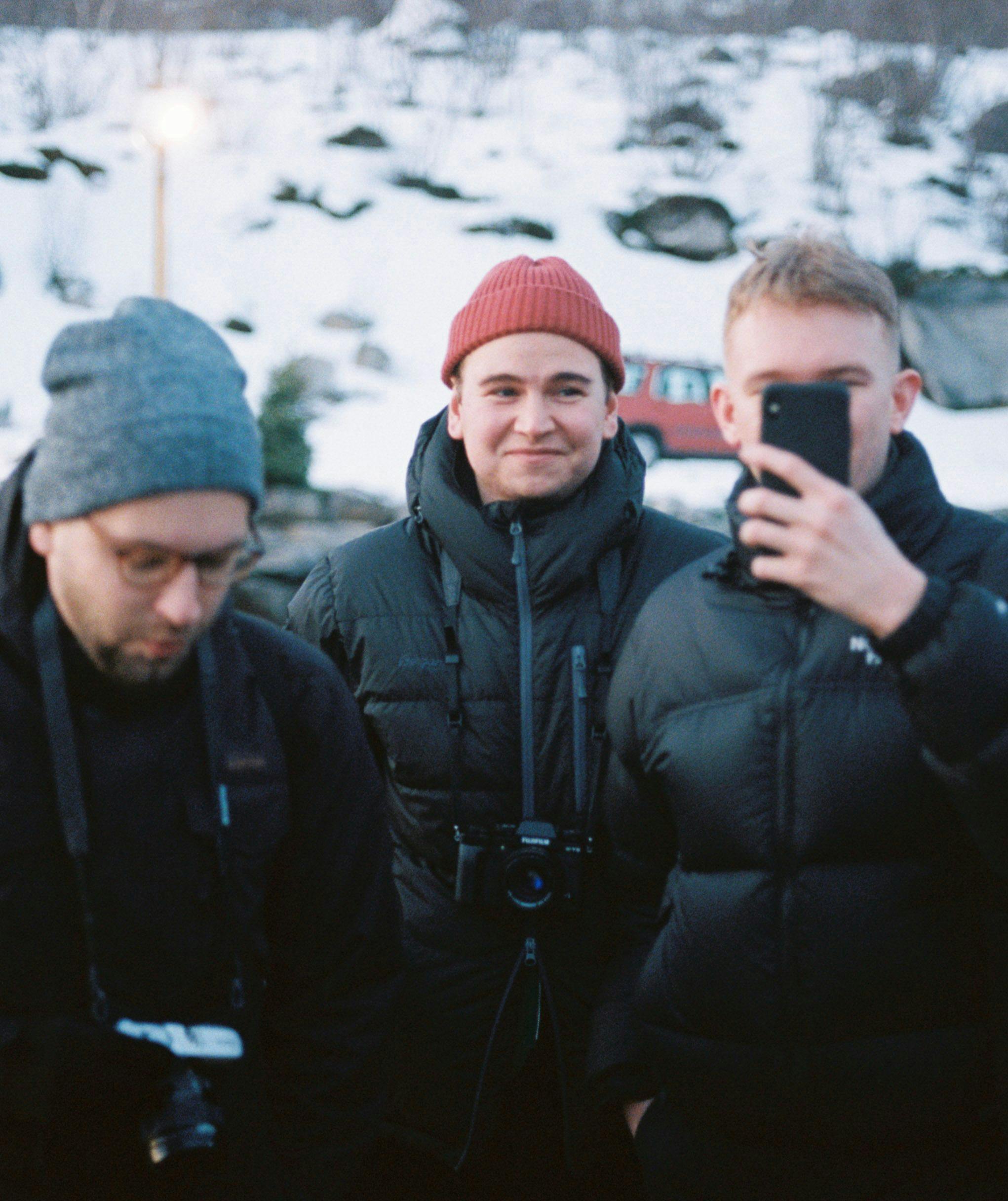 Three men taking a selfie