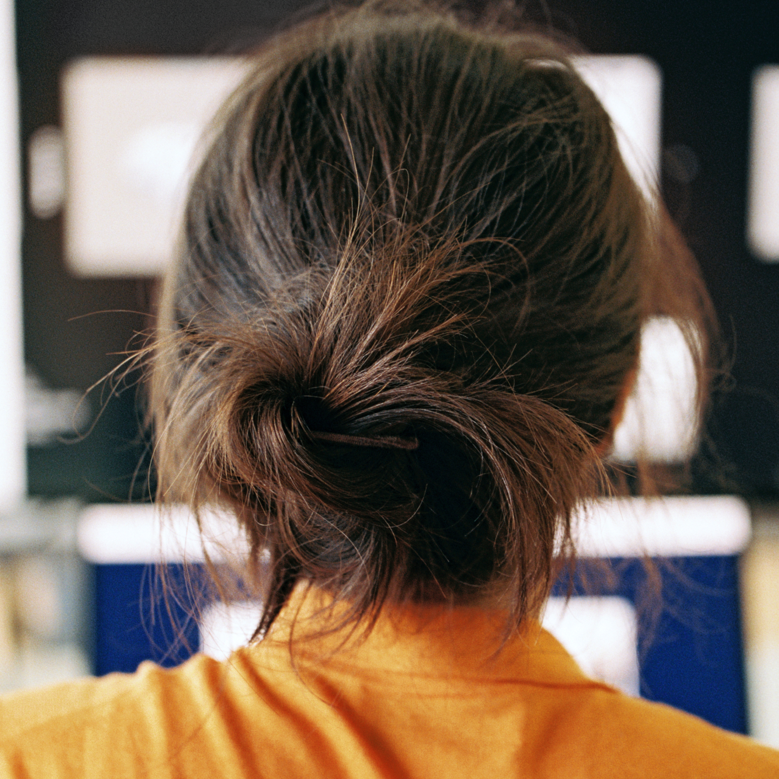 Close-up of a woman's hair seen from behind